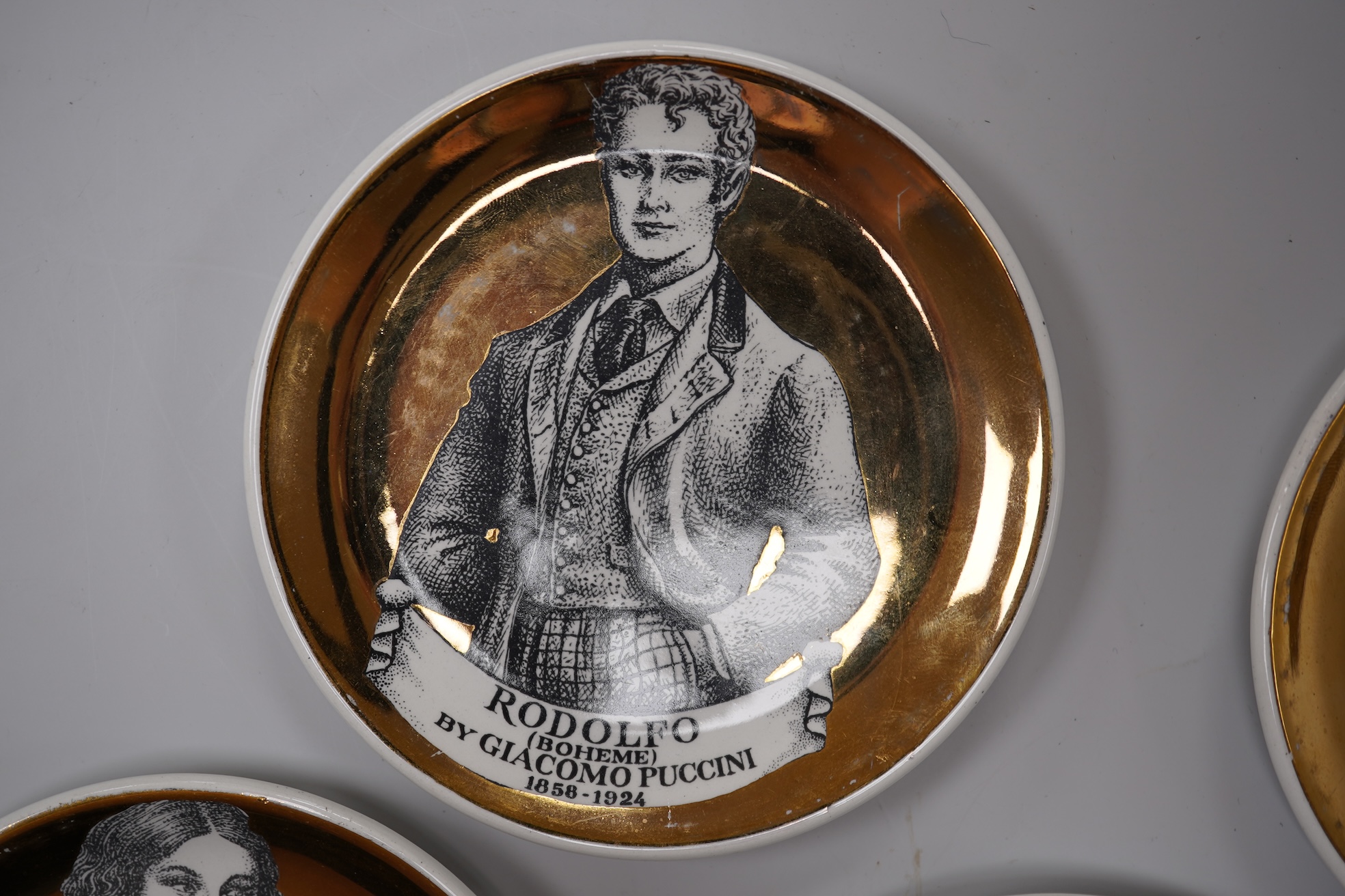 Fornasetti, a group of five operatic coasters, ‘Melodramma’ to include Otello and Desdemona, 10cm in diameter